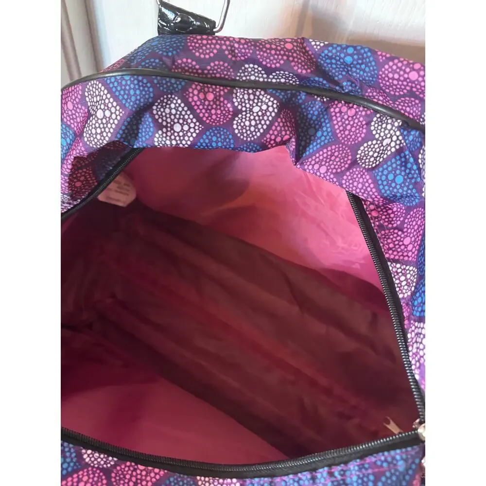 Kathy Van Zeeland 22-inch rolling weekender duffle bag.